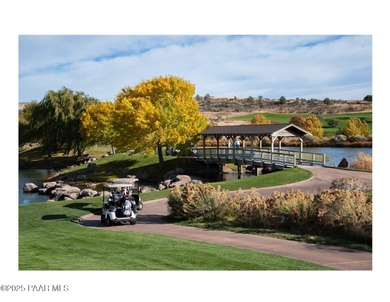 Located on the 9th hole of The Club at Prescott Lakes, this on Prescott Lakes Golf and Country Club in Arizona - for sale on GolfHomes.com, golf home, golf lot