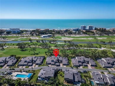 Situated behind gates of the coveted Bay Isles on Longboat Key on Longboat Key Golf Club Resort in Florida - for sale on GolfHomes.com, golf home, golf lot