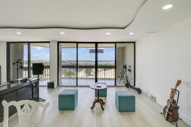 Enjoy breathtaking views from this 2 Bedroom 2 Bath corner unit on The President Country Club in Florida - for sale on GolfHomes.com, golf home, golf lot