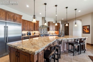 Experience luxurious Colorado living in this stunning on Kings Deer Golf Club in Colorado - for sale on GolfHomes.com, golf home, golf lot