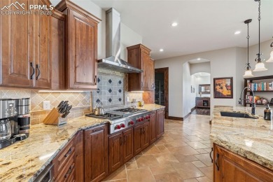 Experience luxurious Colorado living in this stunning on Kings Deer Golf Club in Colorado - for sale on GolfHomes.com, golf home, golf lot