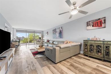 LOVE where you live in this beautifully renovated 4th Floor on Palm-Aire Country Club and Resort - Palms in Florida - for sale on GolfHomes.com, golf home, golf lot