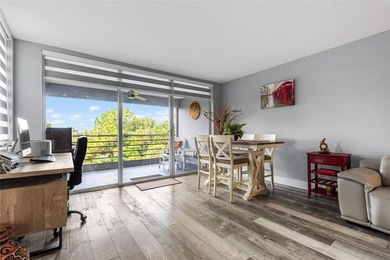 LOVE where you live in this beautifully renovated 4th Floor on Palm-Aire Country Club and Resort - Palms in Florida - for sale on GolfHomes.com, golf home, golf lot