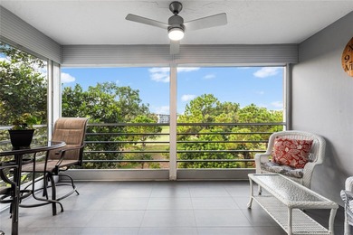 LOVE where you live in this beautifully renovated 4th Floor on Palm-Aire Country Club and Resort - Palms in Florida - for sale on GolfHomes.com, golf home, golf lot