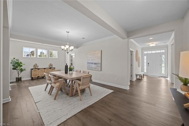 Stylish one-level home in a resort-style community featuring an on Sound Golf Links at Albemarle Plantation in North Carolina - for sale on GolfHomes.com, golf home, golf lot