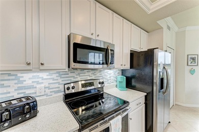 Experience refined Florida living in this exquisitely UPDATED on River Strand Golf and Country Club At Heritage Harbour  in Florida - for sale on GolfHomes.com, golf home, golf lot