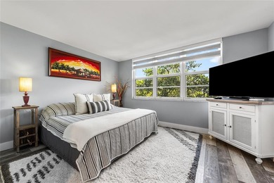 LOVE where you live in this beautifully renovated 4th Floor on Palm-Aire Country Club and Resort - Palms in Florida - for sale on GolfHomes.com, golf home, golf lot