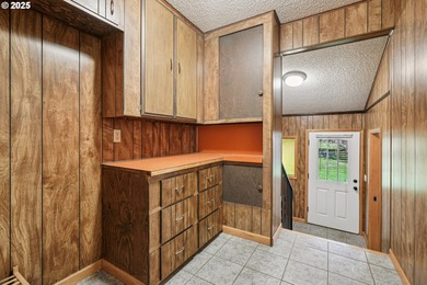 Experience rare riverfront living in a secluded Woodland on Lewis River Golf Course, Inc. in Washington - for sale on GolfHomes.com, golf home, golf lot