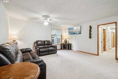 Experience rare riverfront living in a secluded Woodland on Lewis River Golf Course, Inc. in Washington - for sale on GolfHomes.com, golf home, golf lot