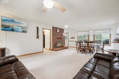 Experience rare riverfront living in a secluded Woodland on Lewis River Golf Course, Inc. in Washington - for sale on GolfHomes.com, golf home, golf lot