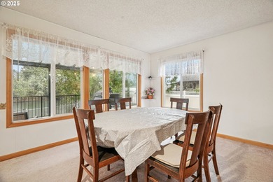 Experience rare riverfront living in a secluded Woodland on Lewis River Golf Course, Inc. in Washington - for sale on GolfHomes.com, golf home, golf lot