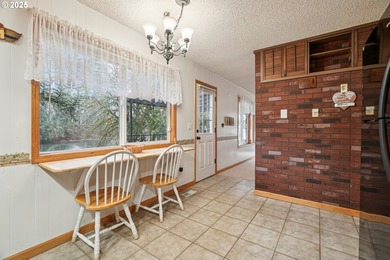 Experience rare riverfront living in a secluded Woodland on Lewis River Golf Course, Inc. in Washington - for sale on GolfHomes.com, golf home, golf lot