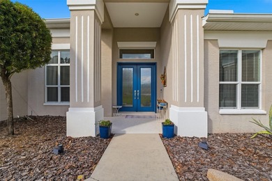 Experience elevated Florida living in this beautifully designed on Southern Woods Golf Club in Florida - for sale on GolfHomes.com, golf home, golf lot