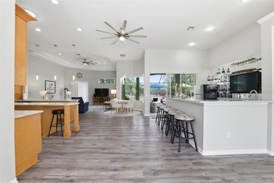 Experience elevated Florida living in this beautifully designed on Southern Woods Golf Club in Florida - for sale on GolfHomes.com, golf home, golf lot