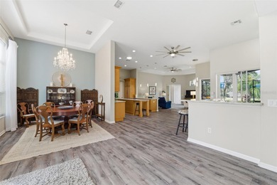 Experience elevated Florida living in this beautifully designed on Southern Woods Golf Club in Florida - for sale on GolfHomes.com, golf home, golf lot