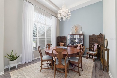 Experience elevated Florida living in this beautifully designed on Southern Woods Golf Club in Florida - for sale on GolfHomes.com, golf home, golf lot