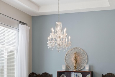 Experience elevated Florida living in this beautifully designed on Southern Woods Golf Club in Florida - for sale on GolfHomes.com, golf home, golf lot