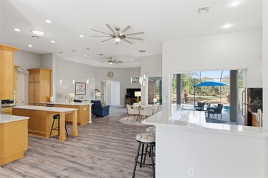 Experience elevated Florida living in this beautifully designed on Southern Woods Golf Club in Florida - for sale on GolfHomes.com, golf home, golf lot