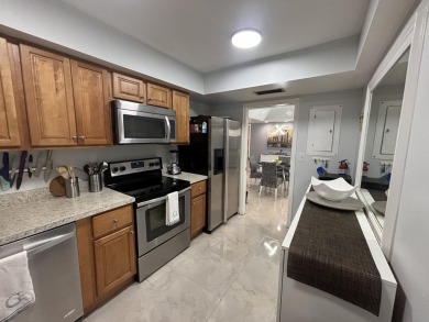 PRICED FOR A QUICK SALE! Beautifully upgraded first-floor condo on The President Country Club in Florida - for sale on GolfHomes.com, golf home, golf lot