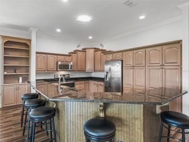 One or more photo(s) has been virtually staged. STONECREST is a on Stonecrest Golf and Club Club in Florida - for sale on GolfHomes.com, golf home, golf lot