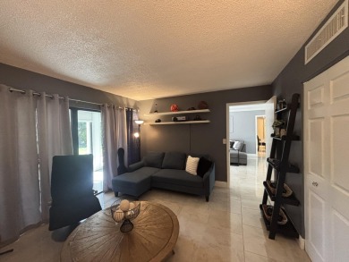 PRICED FOR A QUICK SALE! Beautifully upgraded first-floor condo on The President Country Club in Florida - for sale on GolfHomes.com, golf home, golf lot