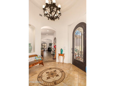 This beautiful property backs to #10 tee box on the Ranch golf on Tonto Verde Golf Club in Arizona - for sale on GolfHomes.com, golf home, golf lot