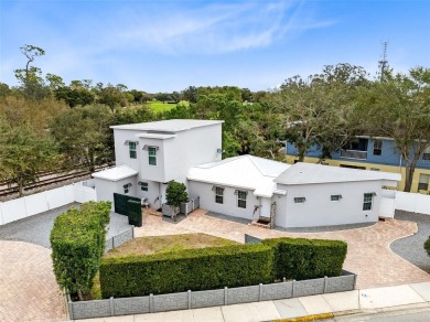 Welcome to this exceptional duplex, a rare gem in Winter Park on Winter Park Country Club in Florida - for sale on GolfHomes.com, golf home, golf lot