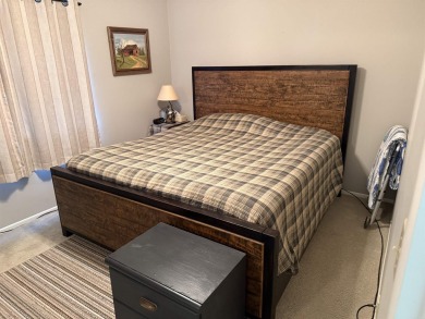 LOOKING FOR A NICE CONDO WITH EXTRA SPACE?  Check out this on Indian Hills Country Club in Arkansas - for sale on GolfHomes.com, golf home, golf lot