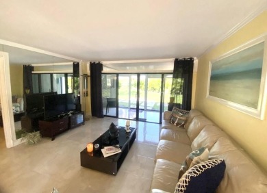 PRICED FOR A QUICK SALE! Beautifully upgraded first-floor condo on The President Country Club in Florida - for sale on GolfHomes.com, golf home, golf lot