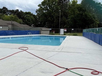 LOOKING FOR A NICE CONDO WITH EXTRA SPACE?  Check out this on Indian Hills Country Club in Arkansas - for sale on GolfHomes.com, golf home, golf lot