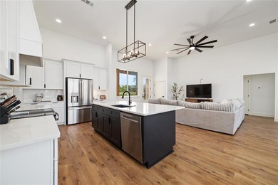 Discover luxury living at 7702 Feather Bay Dr, where new on Hideout Golf Club and Resort  in Texas - for sale on GolfHomes.com, golf home, golf lot