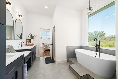 Discover luxury living at 7702 Feather Bay Dr, where new on Hideout Golf Club and Resort  in Texas - for sale on GolfHomes.com, golf home, golf lot