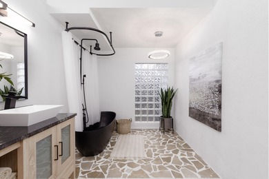 Welcome to a striking transformation of mid-century modern on Bloomington Country Club in Utah - for sale on GolfHomes.com, golf home, golf lot