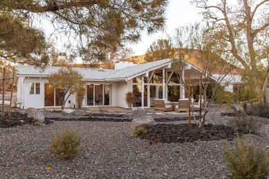 Welcome to a striking transformation of mid-century modern on Bloomington Country Club in Utah - for sale on GolfHomes.com, golf home, golf lot
