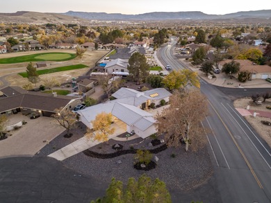 Welcome to a striking transformation of mid-century modern on Bloomington Country Club in Utah - for sale on GolfHomes.com, golf home, golf lot