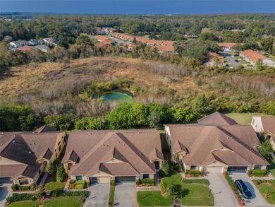 IN TIMBER GREENS A 55+ GATED GOLF COMMUNITY... This 2-bedroom 2 on Timber Greens Country Club in Florida - for sale on GolfHomes.com, golf home, golf lot