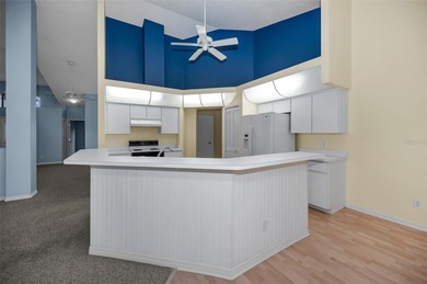 IN TIMBER GREENS A 55+ GATED GOLF COMMUNITY... This 2-bedroom 2 on Timber Greens Country Club in Florida - for sale on GolfHomes.com, golf home, golf lot