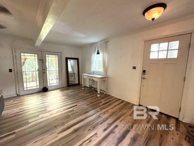 Excellent Fixer-Upper Opportunity in Lake ForestThis charming on Lake Forest Yacht and Country Club in Alabama - for sale on GolfHomes.com, golf home, golf lot