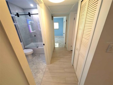 NO FLOOD ZONE-- Move-in ready with major upgrades already on St. Petersburg Country Club in Florida - for sale on GolfHomes.com, golf home, golf lot