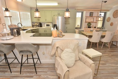 LAND OWNED-NO LAND LEASE This beautifully updated home is on Savanna Golf Club in Florida - for sale on GolfHomes.com, golf home, golf lot