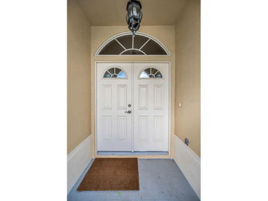 IN TIMBER GREENS A 55+ GATED GOLF COMMUNITY, THIS HOME IS on Timber Greens Country Club in Florida - for sale on GolfHomes.com, golf home, golf lot