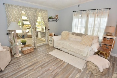 LAND OWNED-NO LAND LEASE This beautifully updated home is on Savanna Golf Club in Florida - for sale on GolfHomes.com, golf home, golf lot