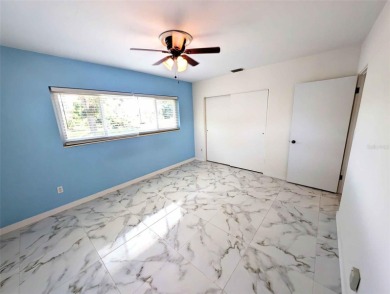 NO FLOOD ZONE-- Move-in ready with major upgrades already on St. Petersburg Country Club in Florida - for sale on GolfHomes.com, golf home, golf lot