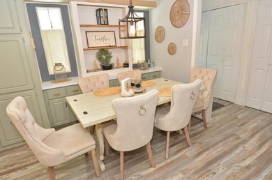 LAND OWNED-NO LAND LEASE This beautifully updated home is on Savanna Golf Club in Florida - for sale on GolfHomes.com, golf home, golf lot