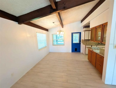 NO FLOOD ZONE-- Move-in ready with major upgrades already on St. Petersburg Country Club in Florida - for sale on GolfHomes.com, golf home, golf lot
