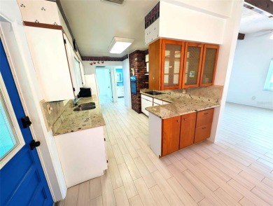 NO FLOOD ZONE-- Move-in ready with major upgrades already on St. Petersburg Country Club in Florida - for sale on GolfHomes.com, golf home, golf lot
