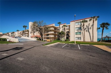 Experience waterfront living at its finest in this large 1315 on Isla Del Sol Yacht and Country Club in Florida - for sale on GolfHomes.com, golf home, golf lot