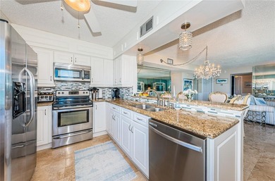 Experience waterfront living at its finest in this large 1315 on Isla Del Sol Yacht and Country Club in Florida - for sale on GolfHomes.com, golf home, golf lot