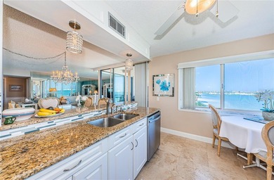 Experience waterfront living at its finest in this large 1315 on Isla Del Sol Yacht and Country Club in Florida - for sale on GolfHomes.com, golf home, golf lot