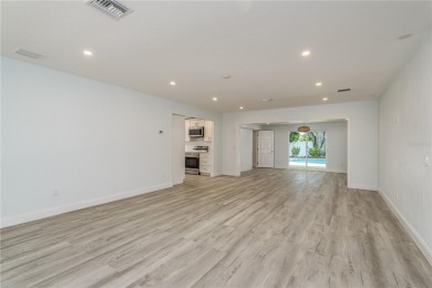 Welcome to 1152 Jackmar Road, a completely renovated 2000sf+ on The Dunedin Country Club in Florida - for sale on GolfHomes.com, golf home, golf lot